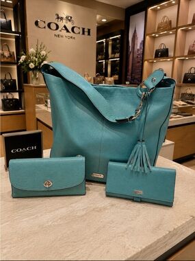 Coach Turquoise leather Hobo Bag with Tassel and Matching Coach Wallets Set